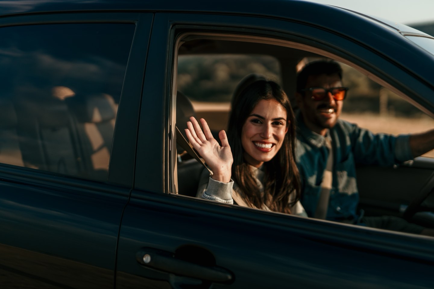 Happy members enjoying a clean car